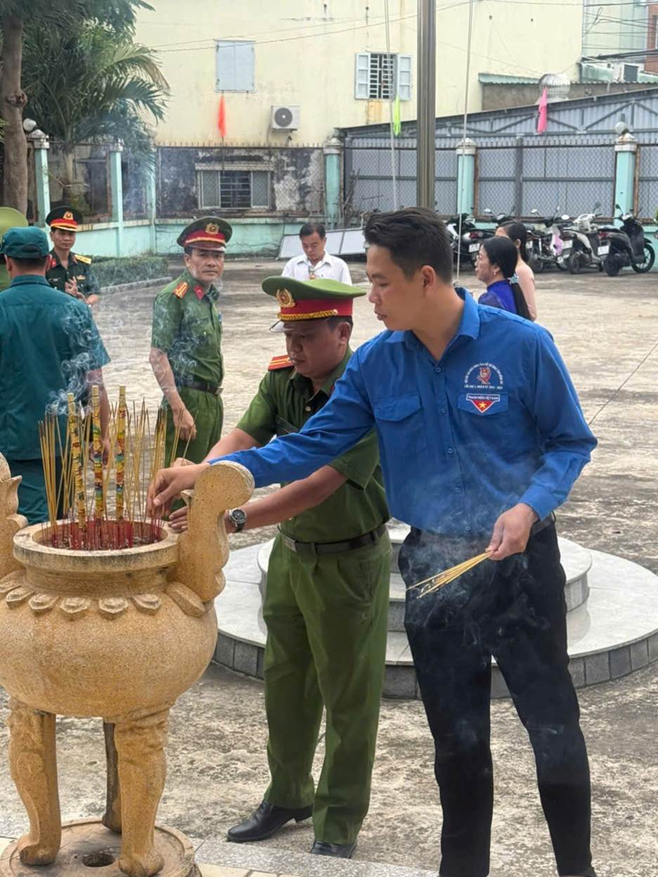 ''A person lighting incense in a pot
AI-generated content may be incorrect.''