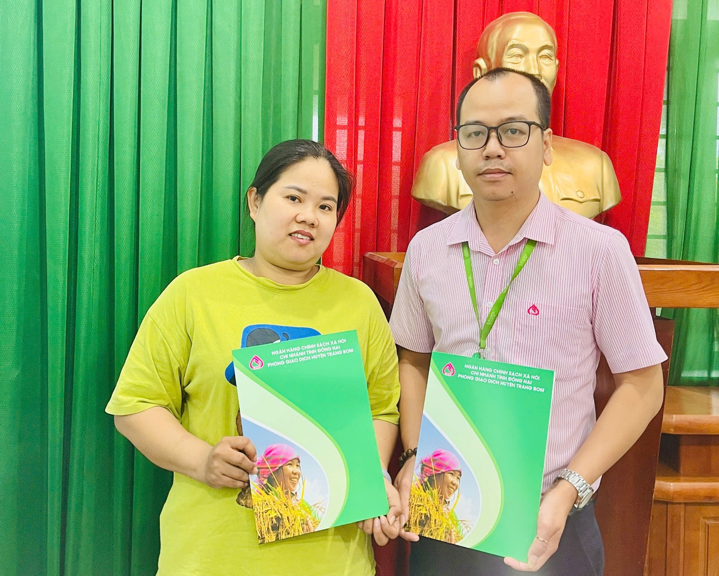 ''A person and person holding up posters
AI-generated content may be incorrect.''