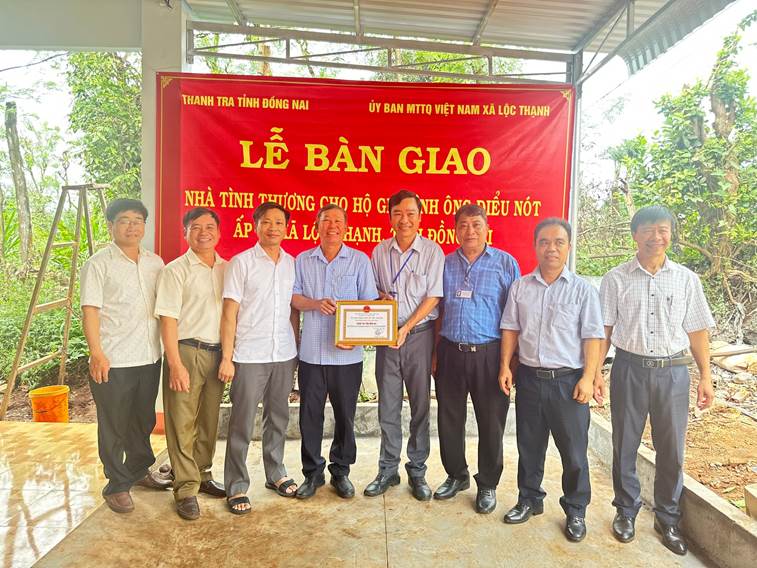 '''A group of men standing together and holding a plaque
AI-generated content may be incorrect.'''
