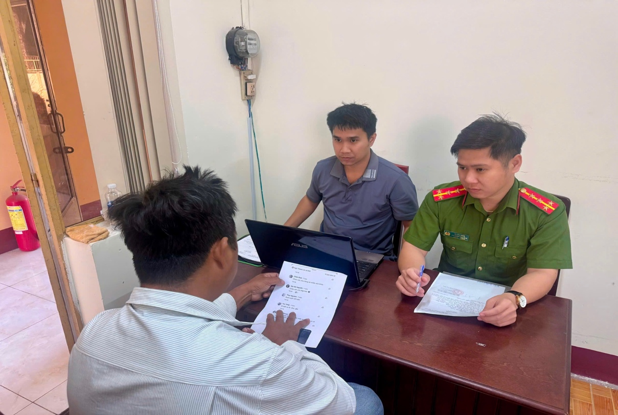 'A group of men sitting at a table with papers and papers
AI-generated content may be incorrect.'