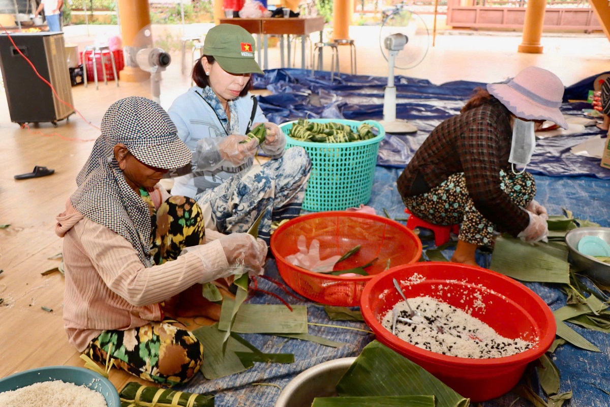 'A group of women making food
AI-generated content may be incorrect.'