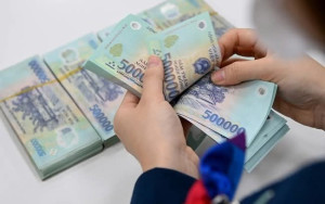 Bảo đảm chế độ tiền lương tương xứng