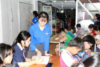 Blue-shirted volunteers sow seeds of knowledge
