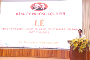 LOC NINH PRESENTS PARTY BADGES TO 78 PARTY MEMBERS ON THE 2 SEPTEMBER OCCASION