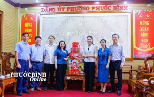 Leaders of Phuoc Long Ward Visit and Extend Lunar New Year Greetings to Phuoc Binh Ward
