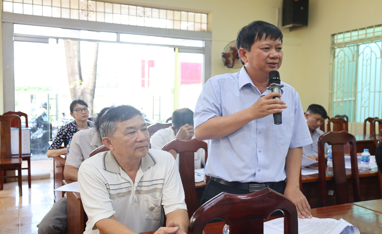 ''A person speaking into a microphone

AI-generated content may be incorrect.''