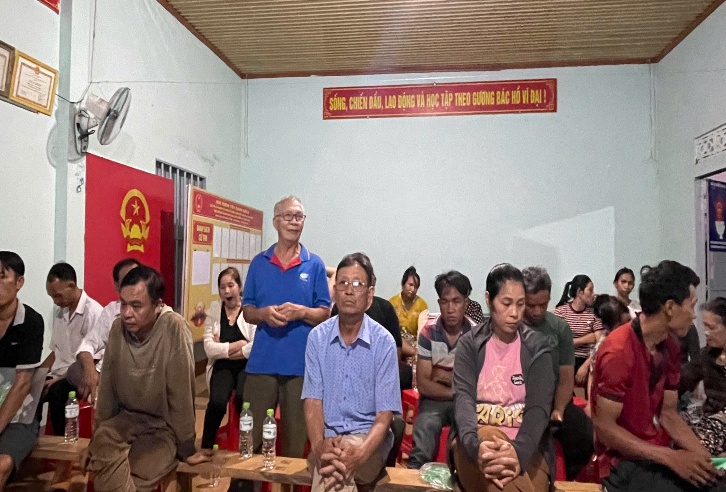 '''''A group of people sitting in a room

Description automatically generated'''''