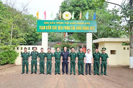 'A group of people in uniform standing in front of a sign

AI-generated content may be incorrect.'