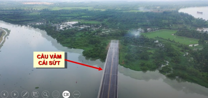 'A road with a bridge over water

AI-generated content may be incorrect.'