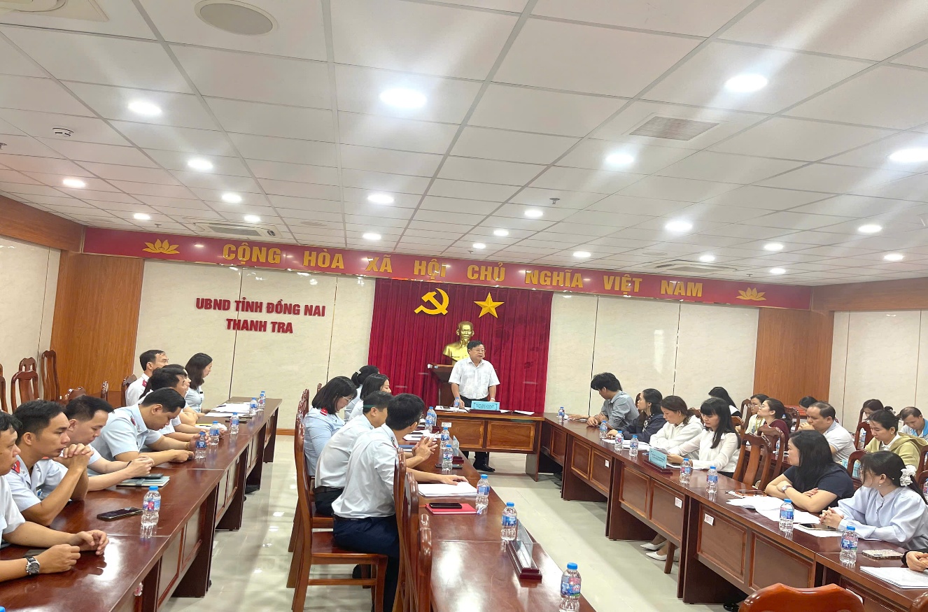 '''A group of people sitting at tables in a room

Description automatically generated'''