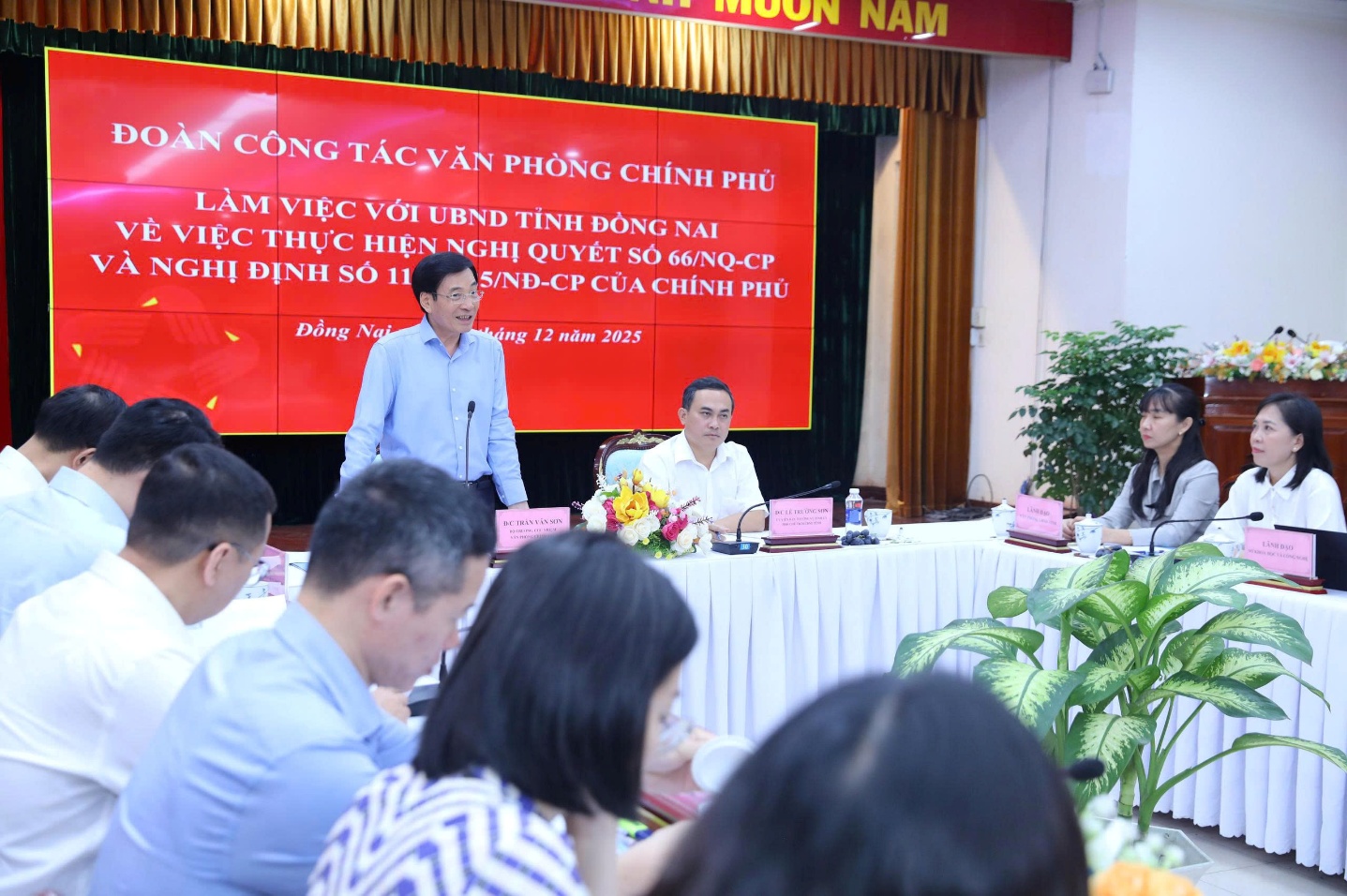 '''Description: A group of people sitting at a table

AI-generated content may be incorrect.'''