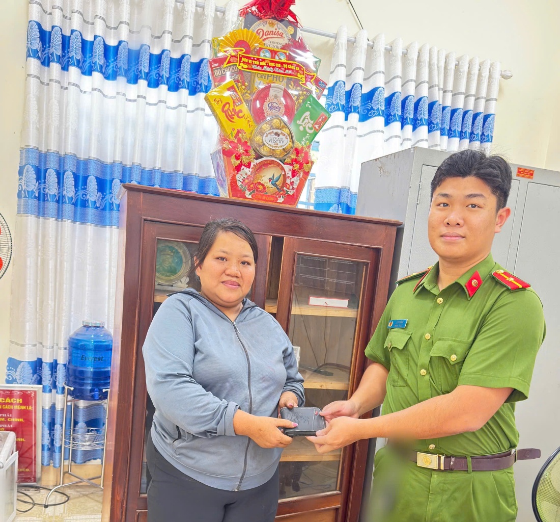''Description: A person in uniform holding a person in front of a cabinet

AI-generated content may be incorrect.''